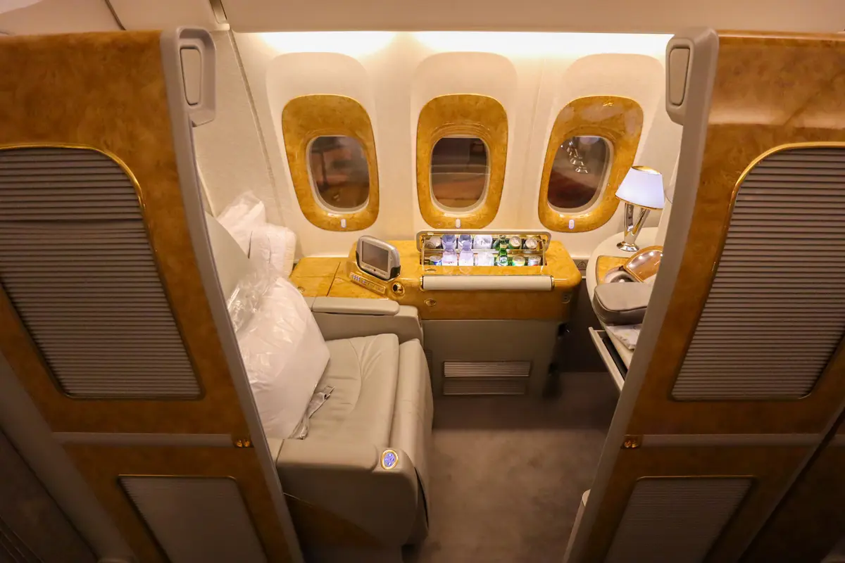 Emirates premium cabin suite with windows and minibar